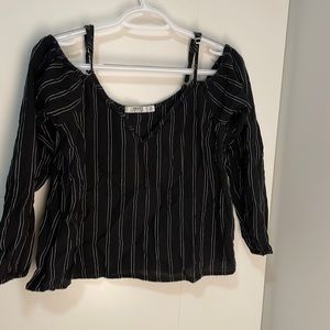 Obey long sleeve with shoulder cut outs. Adjustable shoulder straps.